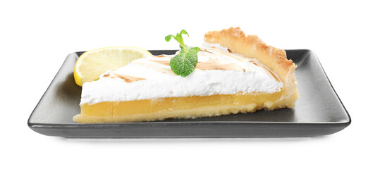 Slice of tasty lemon meringue tart with mint isolated on white
