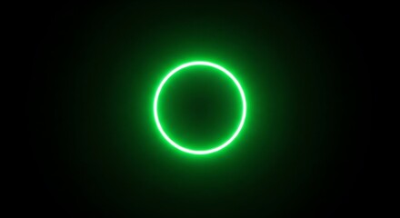 A glowing green circle emits a vibrant and ethereal light against a dark backdrop, creating a captivating and modern visual effect