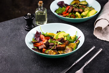 Healthy vegan keto salad with tofu and avocado