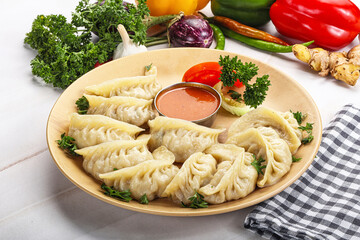 Tibetian dumplings Momo with chicken, meat or vegetables