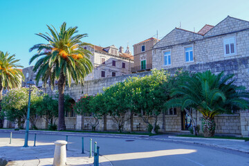 Road around Korcula old town walls, Croatia. Korcula is a historic fortified town on the protected east coast of the island of Korcula.
