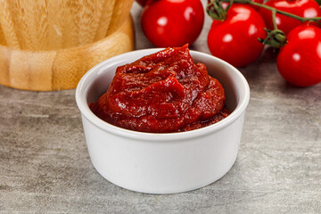 Red tomato paste in the bowl