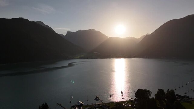 Sunset over Achensee Lake, Austrian Alps - aerial drone view
