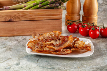 Fried crispy pork bacon snack