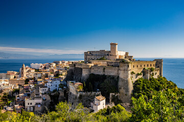 Fototapeta premium Gaeta, Latina, Lazio, Italy. A splendid view of the city from the top of Monte Orlando. The imposing Angevin-Aragonese castle dominates the ancient village overlooking the sea from the clifftop.