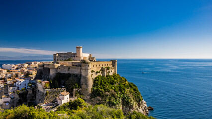 Obraz premium Gaeta, Latina, Lazio, Italy. A splendid view of the city from the top of Monte Orlando. The imposing Angevin-Aragonese castle dominates the ancient village overlooking the sea from the clifftop.
