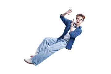 Fearless Fall: A young man in mid-air expresses the initial fear as he seems to be floating freely with outstretched hand. Capturing moment of courage in the face of the unknown. 