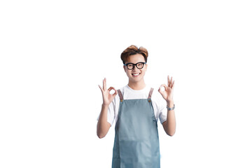 Smiling and Appreciative: A confident barista radiates positivity, gesturing an OK sign with both hands, inviting viewers to savor the finest coffee with his cheerful assurance.