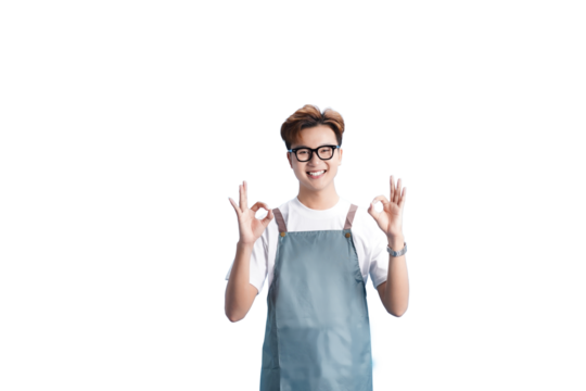 Smiling and Appreciative: A confident barista radiates positivity, gesturing an OK sign with both hands, inviting viewers to savor the finest coffee with his cheerful assurance.