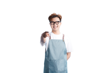 Cheerful young cook with glasses, pointing towards camera