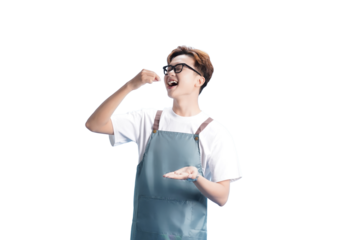 Culinary Delight: A smiling individual in an apron savoring a small portion of food with delight, perfectly capturing the essence of culinary pleasure.