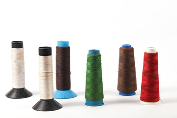 Colorful vintage sewing spools for creative craft projects and textile design inspiration, perfect for fashion blogs and DIY tutorials