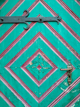 Old wooden door with colourful paint