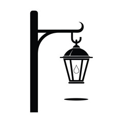 Black silhouette of a classic street lamp or lantern