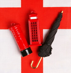 Symbols of England against the background of the flag of England