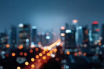 Blurry urban skyline at night with bokeh city lights