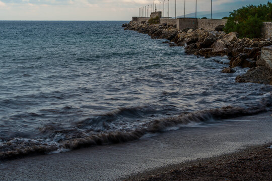 Rocky coastline with gentle evening waves