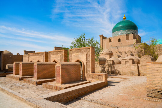 Tombs next to the Pahlavan Mahmoud Mausoleum in Ichan Kala, the old city of Khiva in Uzbekistan, Central Asia