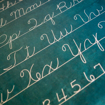 New York City, NY, USA. Blackboad with cursive handwriting