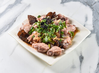 Steamed chicken dish with wood ear mushrooms and fresh herbs, a culinary delight offering a healthy and tasty experience.