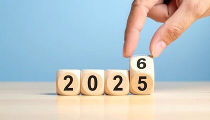 New Year 2026 Transition Concept from 2025 to 2026 with Wooden Cubes