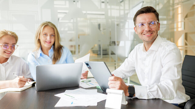 Group of professionals engaging in a meeting at office - Powered by Adobe
