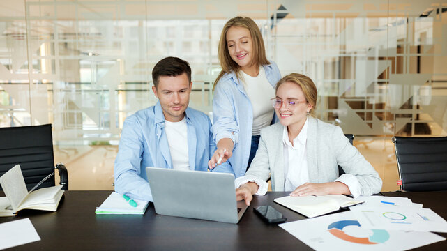 Team collaboration in a modern office space