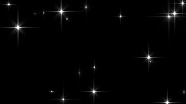 Sparkling, blinking stars. Glowing glitter particles create a magical, festive effect. Twinkle flare light background. Seamless loop. Embedded transparency