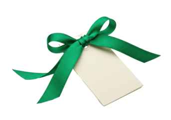 Angled cream gift tag with vibrant emerald green satin bow and flowing ribbons, isolated on transparent background with copy space, elegant gift presentation concept