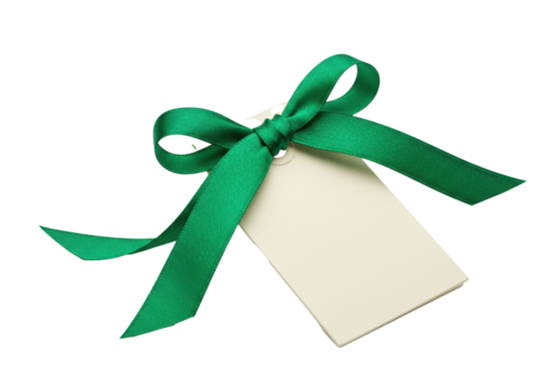 Angled cream gift tag with vibrant emerald green satin bow and flowing ribbons, isolated on transparent background with copy space, elegant gift presentation concept