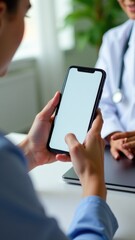 A woman holds her cell phone while a doctor stands in the background, likely discussing treatment or medication