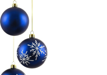 Four spherical deep sapphire blue christmas ornaments, two glossy, two with white snowflakes, hanging on golden strings on a transparent studio background, elegant holiday display.