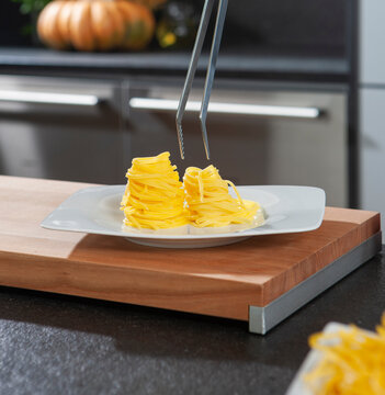 Still life of kitchen during a cooking session with pasta