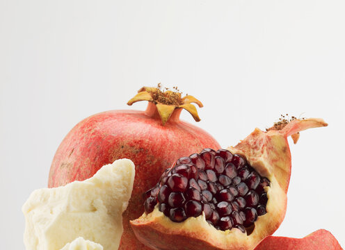 Still life of pomegranate and shea butter