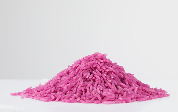 Still life of pink rice in a pile