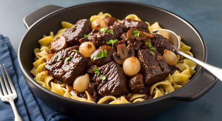 Savor tender beef bourguignon with pearl onions and mushrooms served over egg noodles