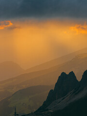 Obraz premium Sunset Over Mountain Peaks Alps
