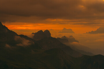 Mountain Range at Sunset with Clouds