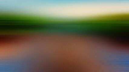 Abstract blurred grainy gradient horizontal background with green, light brown, and spots.