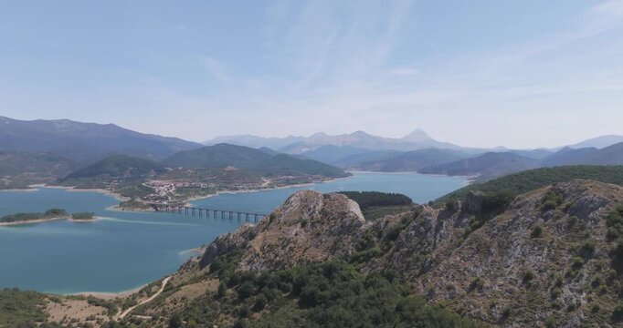 Aerial drone shot of Ria&ntilde;o and the Picos de Europa mountains.