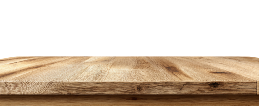 Close-up view of a light brown wooden tabletop against a black background