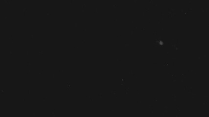 Authentic old projector look: Dust and Grain Overlay. Seamlessly loopable effect for historical documentary style.