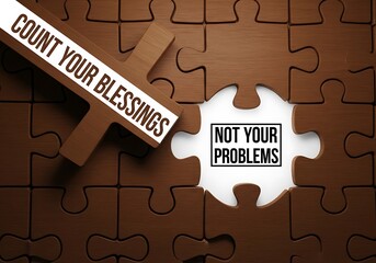 A conceptual image featuring brown puzzle pieces with the phrases count your blessings and not your problems displayed inspiring positivity