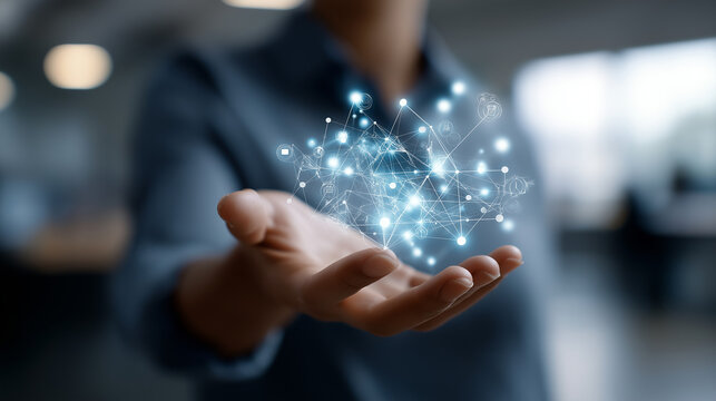 Faceless executive hand holding machine computation symbols with network connections blurred background technology industry growth acceleration business innovation fostering