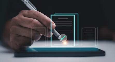 Digital document approval concept. Businessman using pen for signing an electronic file with a glowing checkmark. Symbolizing secure e-signature, authentication and modern paperless workflow.