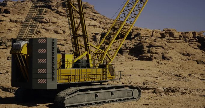 A large yellow construction crane works on rugged terrain, lifting heavy materials in a dry and arid environment. Bright sunlight illuminates the rocky landscape around it.