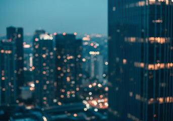 Night city view with a green digital pattern of a computer motherboard and electronic circuit board texture