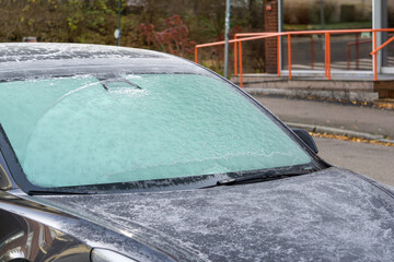 Frosted Car Windshield on a Cold Morning - Ice Covered Vehicle Glass Winter Weather