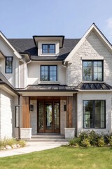 Experience the charm of a newly designed modern house, featuring a chic entryway and stunning landscaping, all set in a peaceful neighborhood under the bright sun