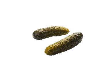 Two barrel-salted cucumbers on white background